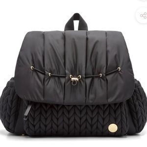 Brand new diaper bag - new with tags, still in original packaging.